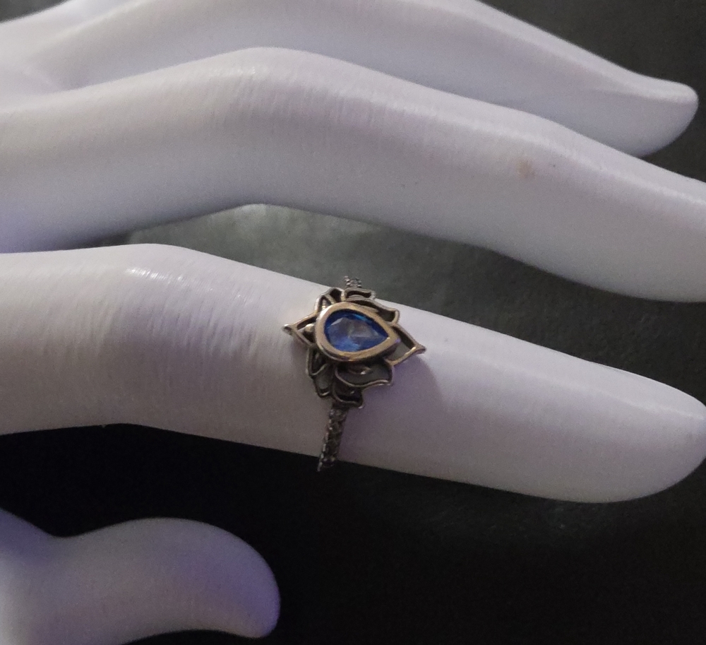 Delicate Silver Ring with Blue Teardrop Stone